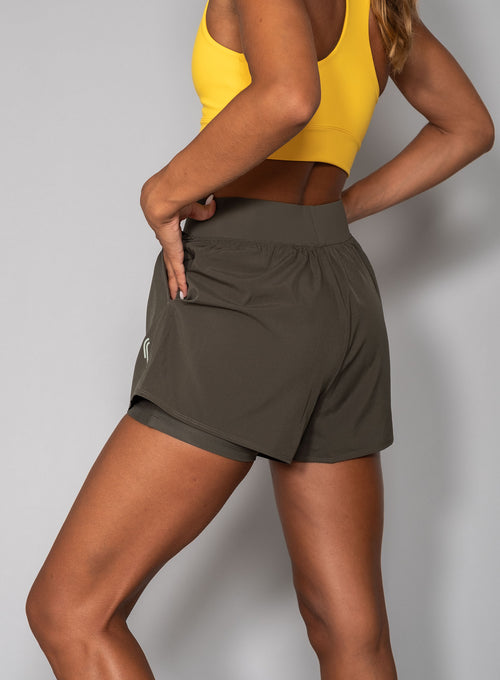 Women's Performance Court Shorts - 2 in 1 with ball pockets Deep green